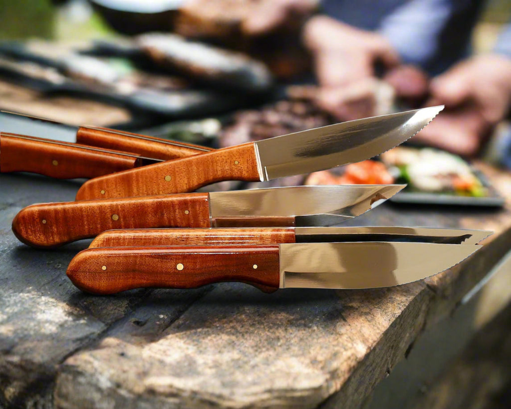 6-piece steak knife set with serrated tips and solid curly Hawaiian koa wood handles by SalterFineCutlery