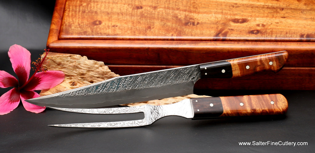 240mm carving knife and fork with long ebony bolster and curly Hawaiian koa wood handles from SalterFineCutlery