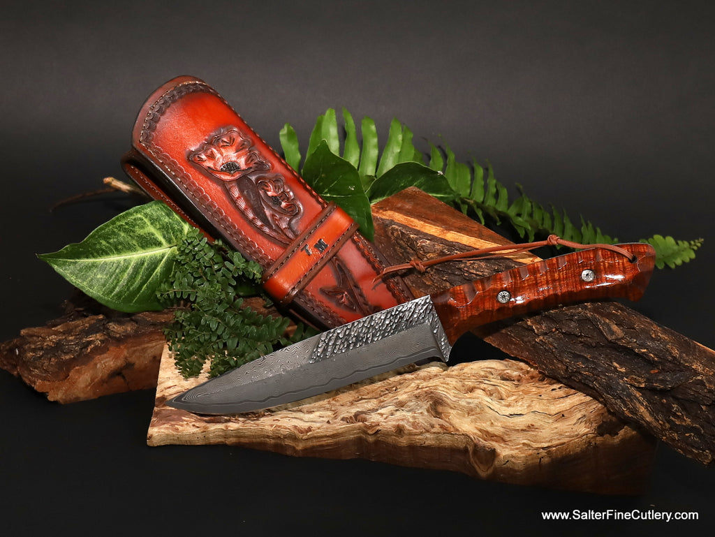 Perfect for hunting or any knife collector SalterFineCutlery hand-forged R2 stainless steel hammered and damascus pattern 180mm blade curly koa wood scalloped handle and handmade personalized leather sheath