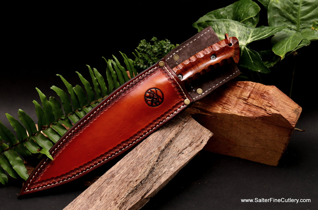 Hunting knife with scalloped handle in a SalterFineCutlery handmade pigskin lined leather belt sheath