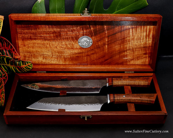 2-piece custom handcrafted chef knife set in handmade curly Hawaiian koa wood keepsake box by SalterFineCutlery featuring two kitchen knives with VG10 hand-forged blades with decorative curly koa and lychee wood handles 