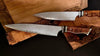 Pair of whirlpool damascus carbon steel chef knives with artist-series handles by SalterFineCutlery handmade and hand-forged
