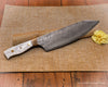 Custom chef knife with 9.5 inch Japanese hand-forged stainless steel blade and Pearl handle with mokume bolster by SalterFineCutlery