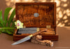 A handmade steak knife set with Hawaiian curly koa wood handles and matching presentation box exclusive luxury made-to-order cutlery