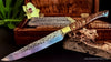 Detail close-up view of a single knife part of an 8-piece steak knife set showing blade pattern, handle pattern, and brass fittings handmade in Hawaii by SalterFineCutlery