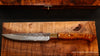 Blade detail one steak knife part of a six piece set featuring hand-forged blades with koa wood and brass bolsters by SalterFineCutlery