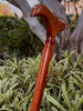 Handcrafted curly koa wood cane by SalterFineCutlery and custom woodworking in Hawaii showing front facing underside detail view of head and top portion of cane shaft
