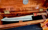 Detail view of hand-forged mirror polish collectible shirogami carbon steel chef knife in presentation box by SalterFineCutlery