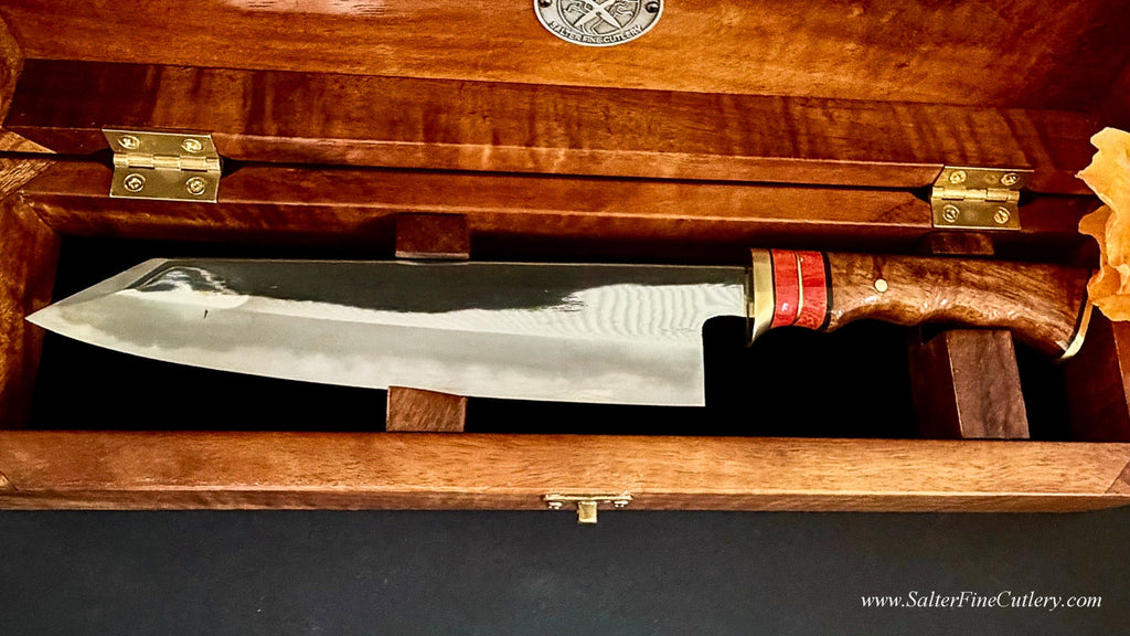 Collectible shirogami hand-forged chef knife from Osaka Japan with mirror polish finish and artist-series handle shown inside open presentation box handcrafted by SalterFineCutlery Hawaii