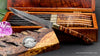 Detail view of single steak knife part of a six-piece hand-forged VG10 stainless damascus steel and handcrafted set with Hawaiian curly koa wood handlles and box by SalterFineCutlery