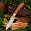 Hunting knife with handcrafted mokume bolster Hawaiian curly koa wood handle and handtooled leather sheath SalterFineCutlery