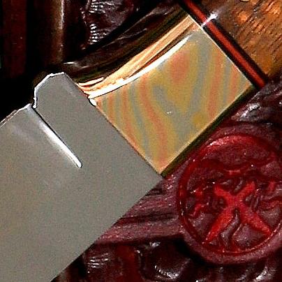 Collectible Hunting knife handcrafted from SalterFineCutlery Mokume contoured bolster detail