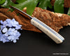 Collectible hunters knife with blue liners  and manufactured snake pattern stone handle from SalterFineCutlery