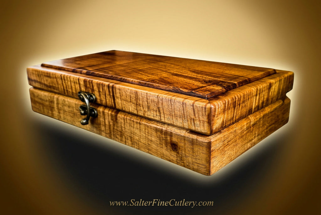 Lid detail from a custom presentation box to hold a collectible knife handcrafted from Hawaiian curly koa wood by SalterFineCutlery 