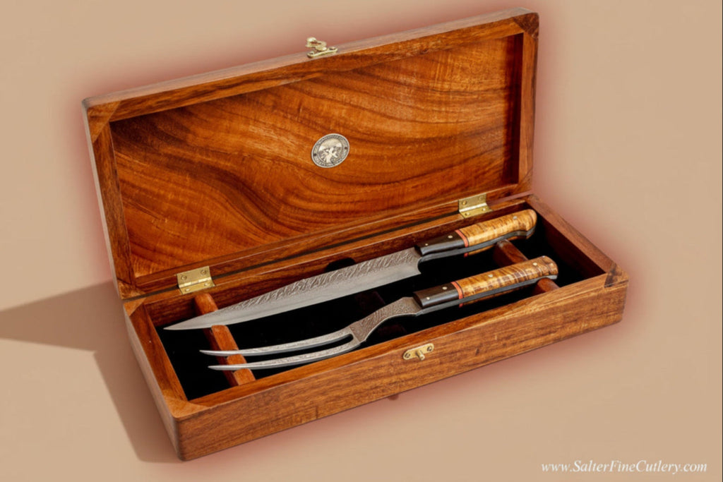 Two-piece carving set in presentation box hand-forged Japanese stainless steel blades from our VillageForge collection and rare koa wood handles and box by SalterFineCutlery Hawaii